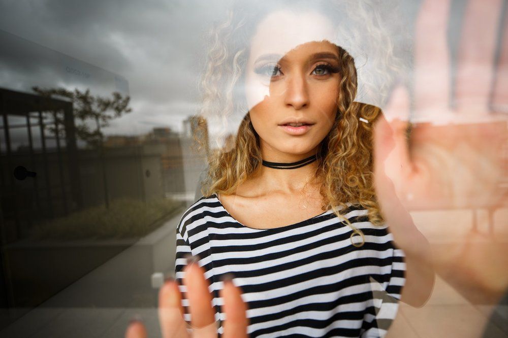 Clara behind the glass