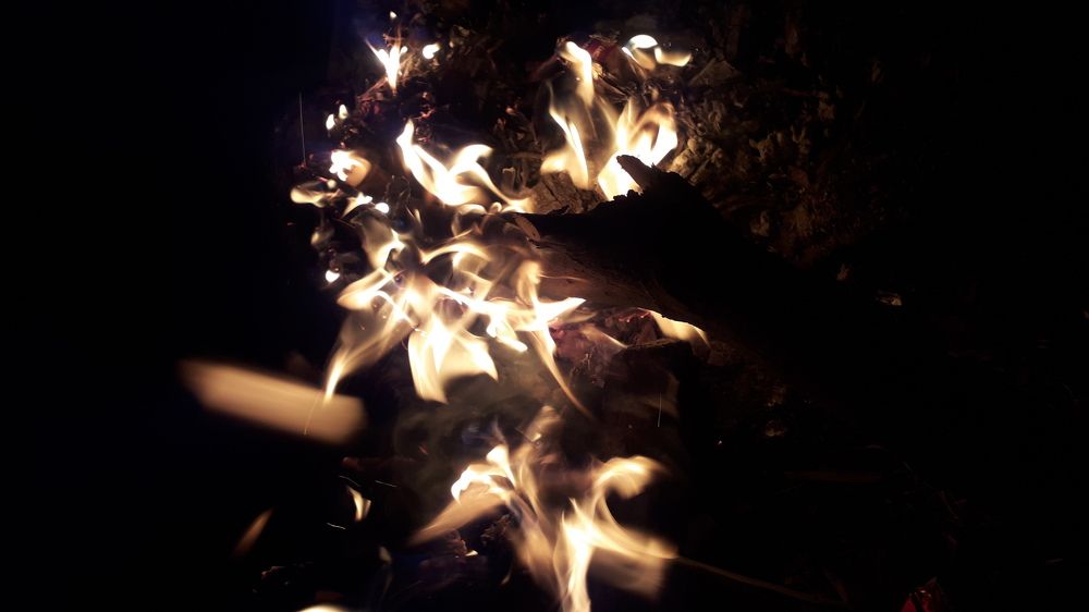 The darkness with little piece of fire