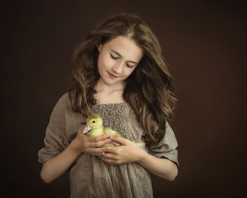 Girl with pet duck