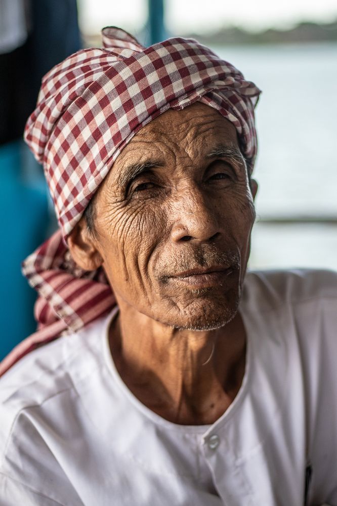 Khmer Man Crossing River