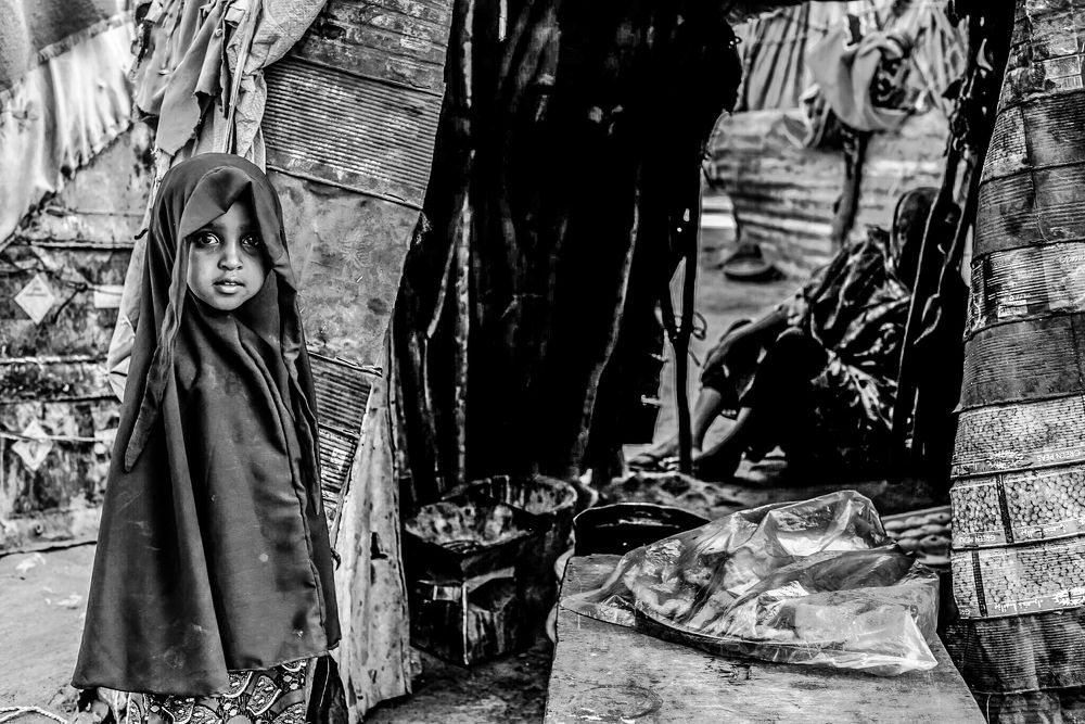 Helping the mum in her street stall