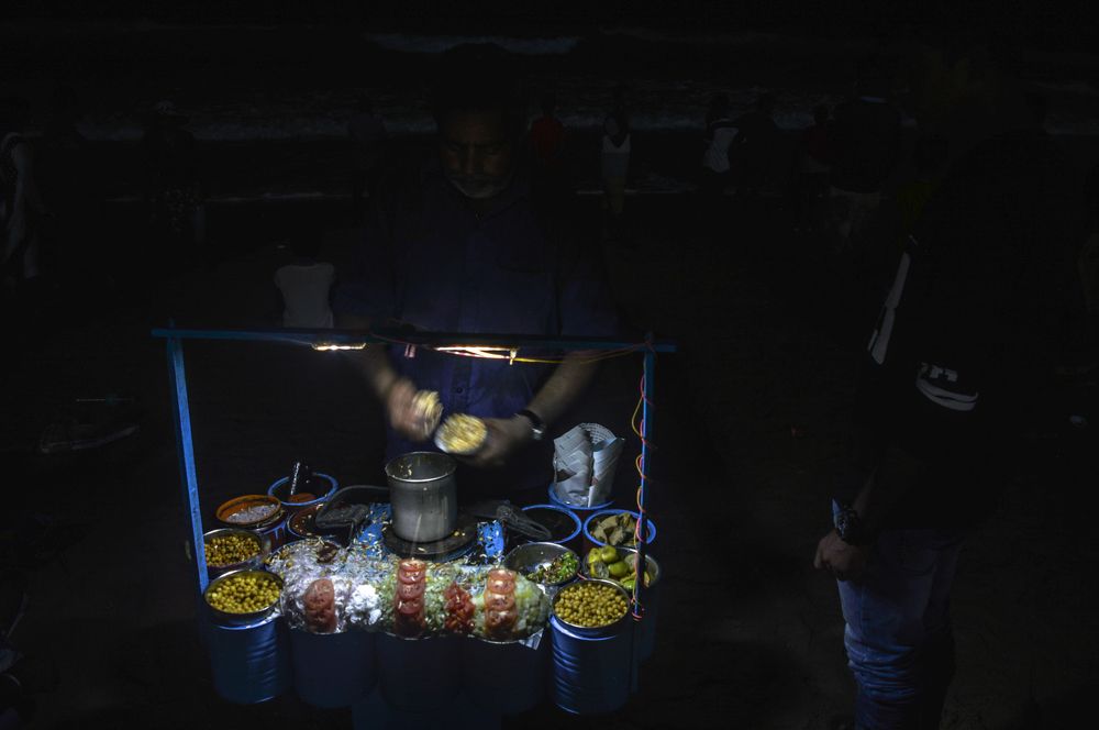 The seaside jhalmuri Seller at night