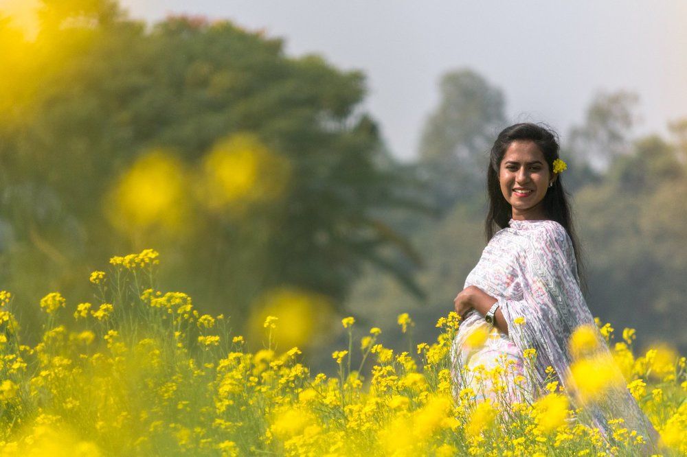 girl in yellow flower