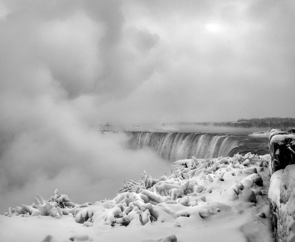 The waterfalls produce a fog during a winter deep freeze