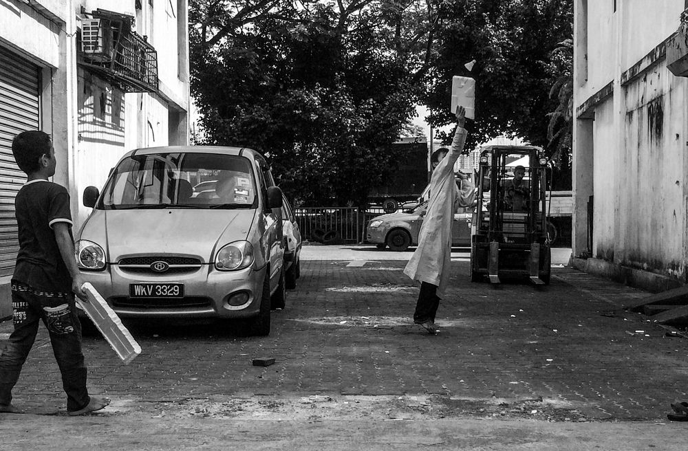 Badminton players of the alley