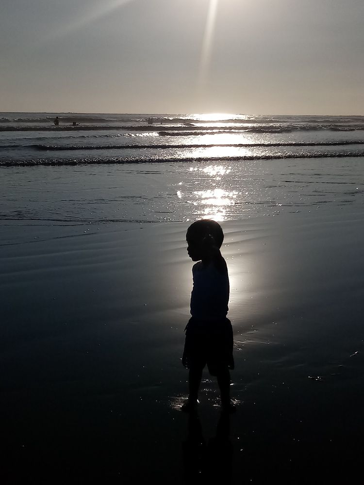 Silhouette among shadows of a sunset