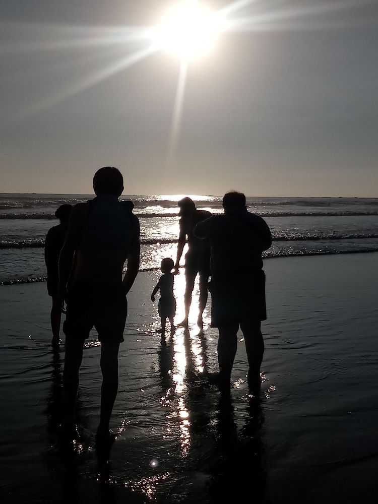 People in the light of a sunset