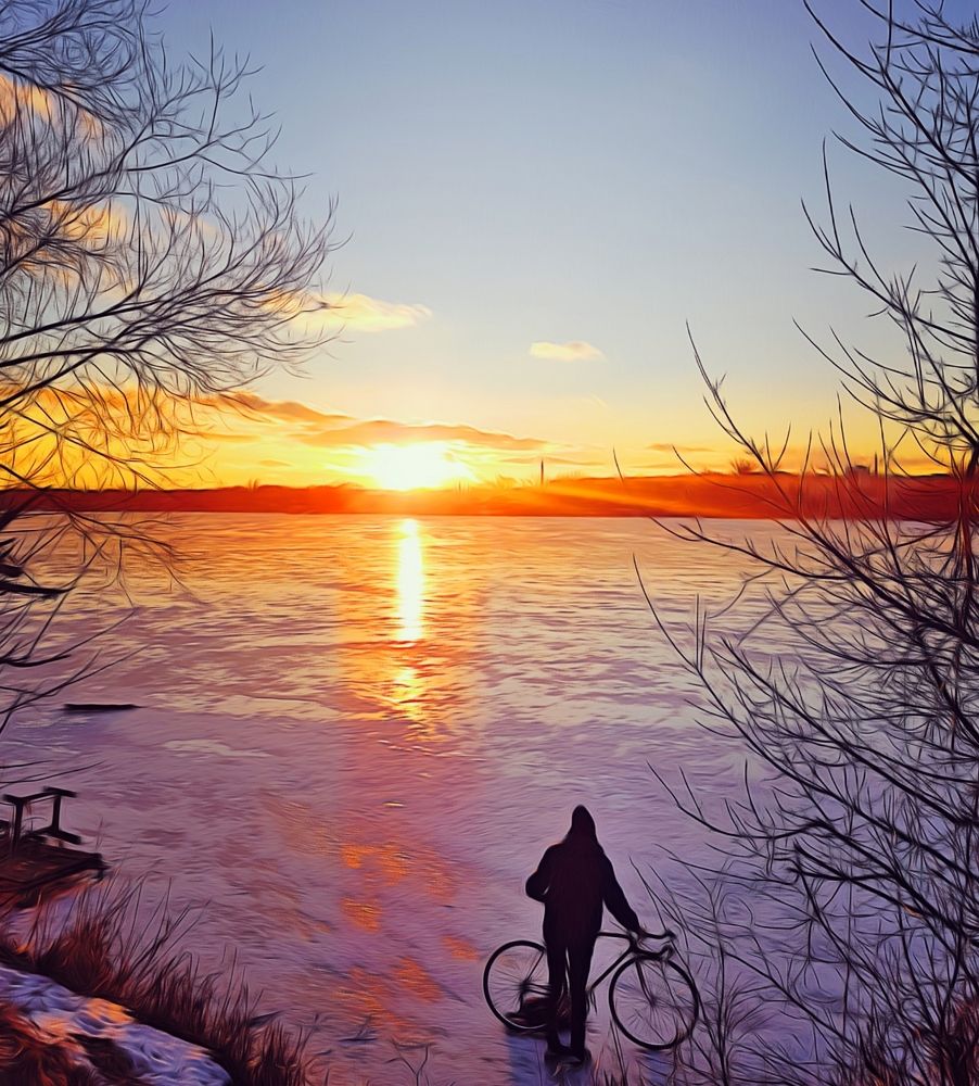 Cyclist on a frozen river
