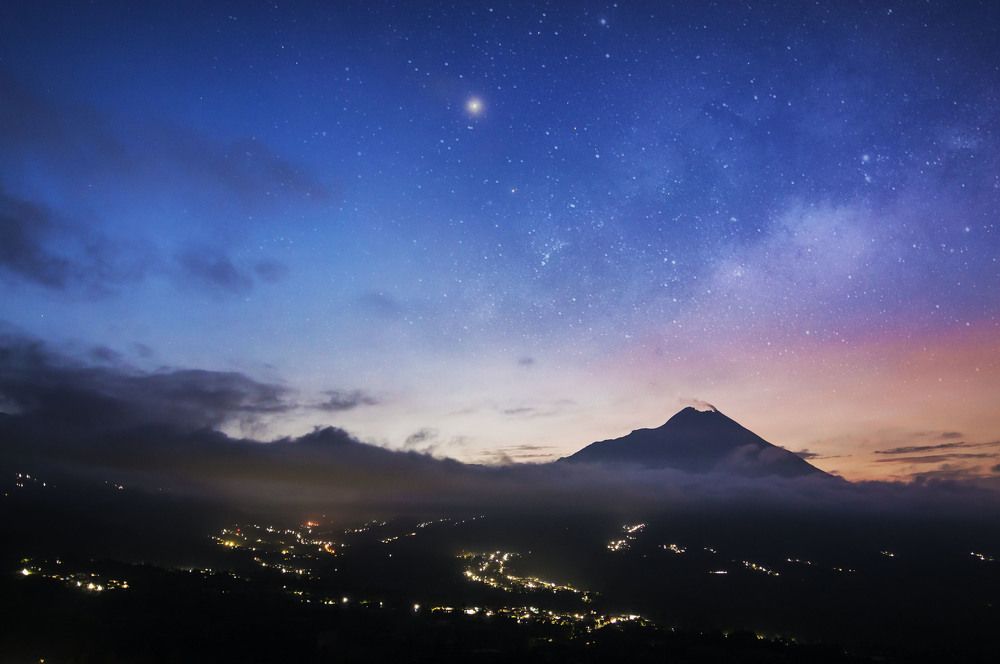 Mount Merapi on rainy season and milkyway