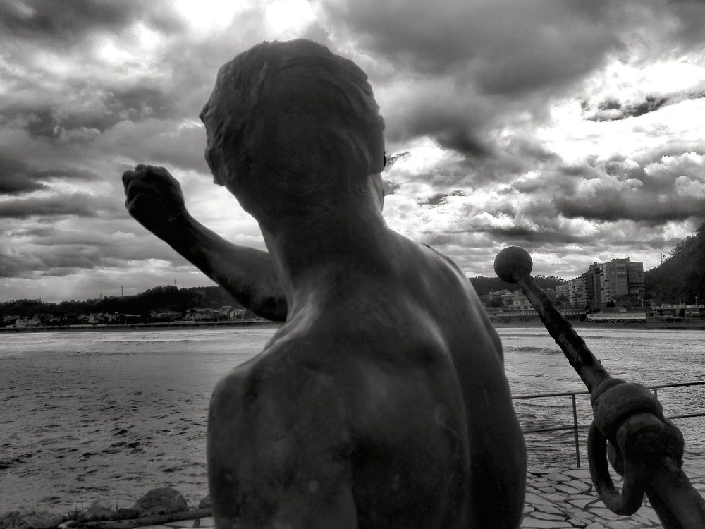 Portrait of man facing the sea, Salinas (Spain)