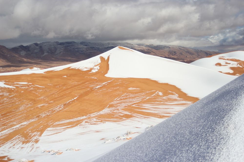 Sahara Desert covered in 15 inches of SNOW as freak weather blankets sand dunes