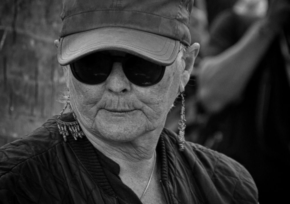 Lady with black spec.