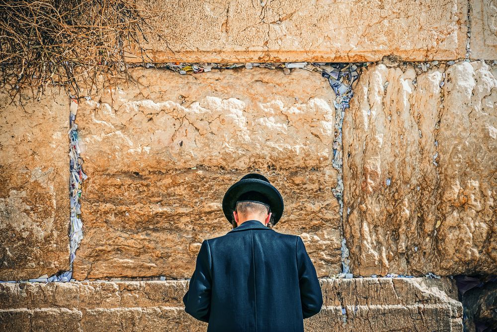 Believing Jew praying near the Western wall