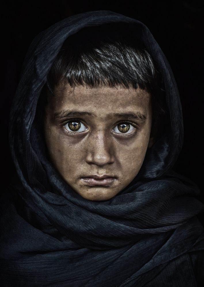 CHILD IN BLACK VEIL