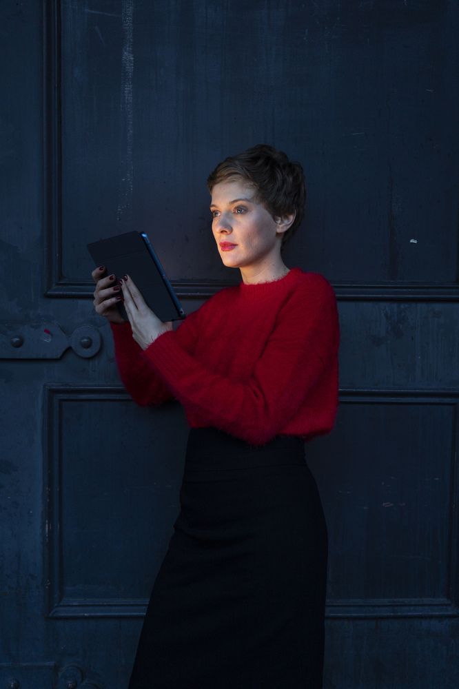 female withtablet at night