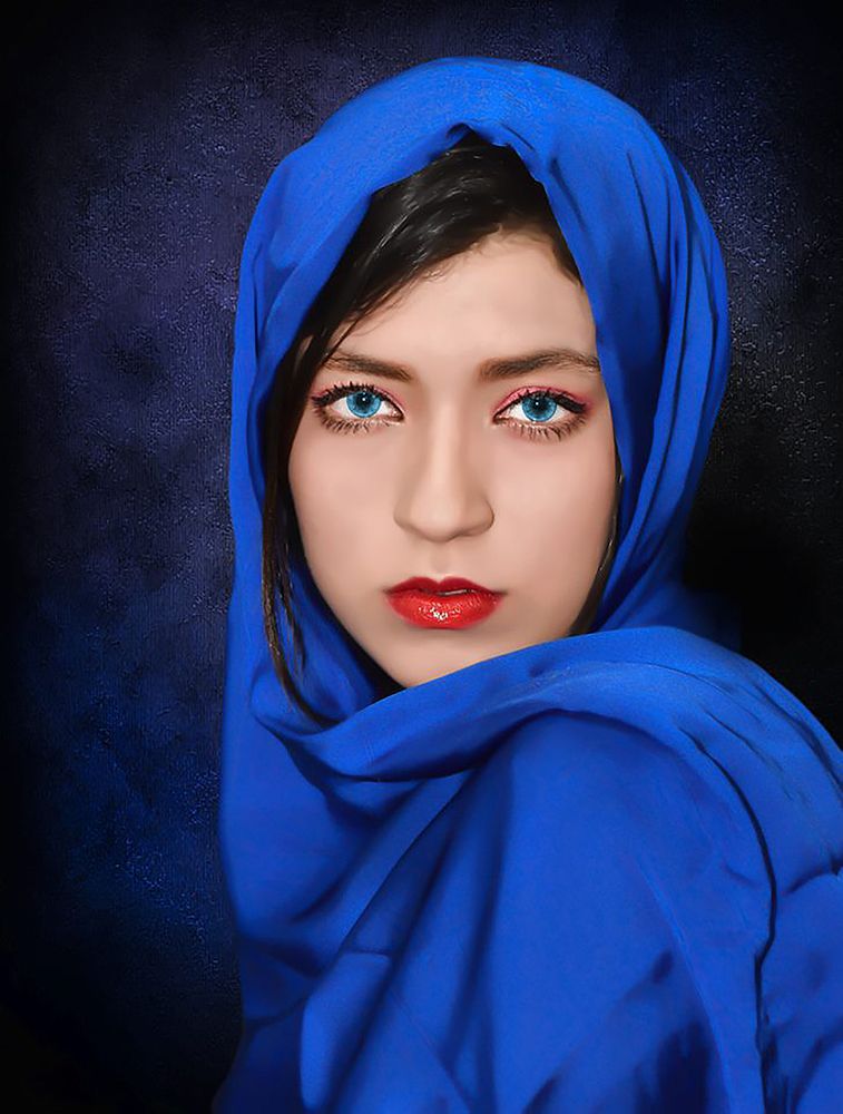 A girl in a blue veil