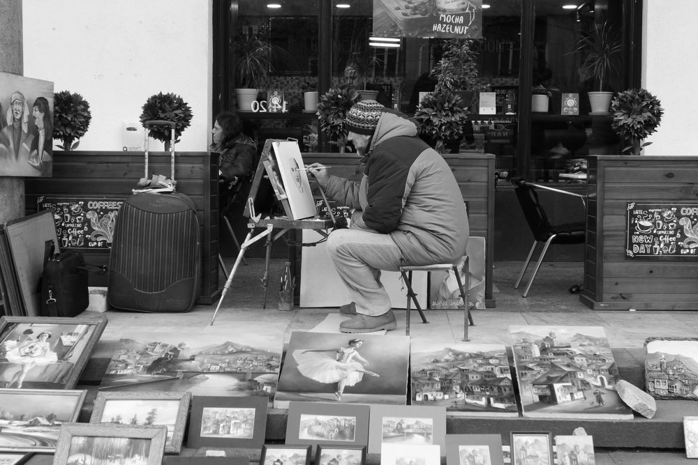 Painter at work in the street.