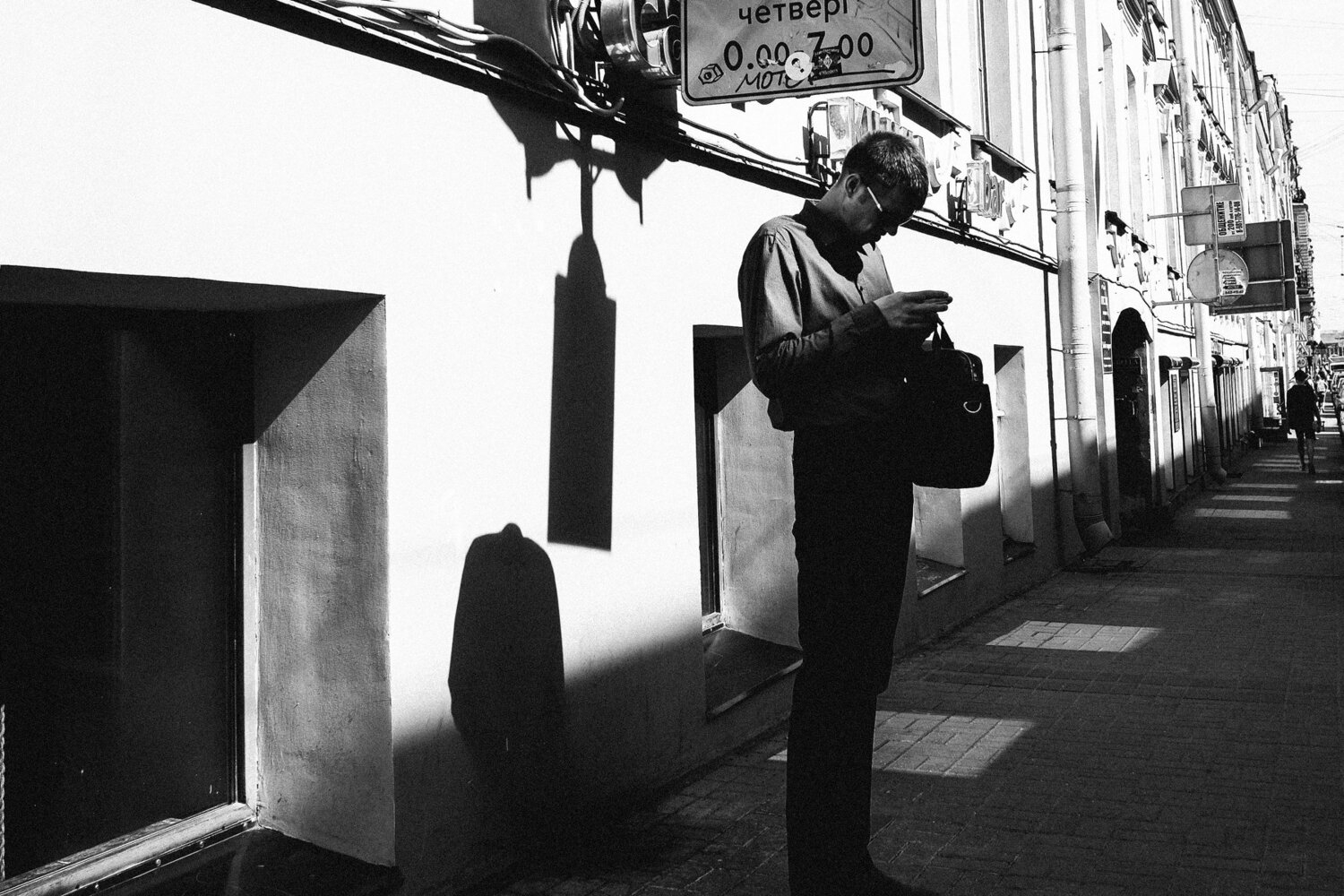 Tall man on street