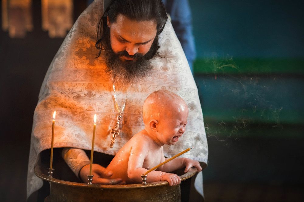 Окунание при Таинстве Крещения