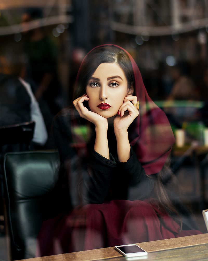 The sad girl in the cafe