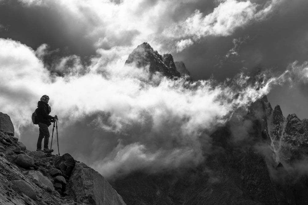 One of My team members was standing in front of the giant Uli Biaho peak