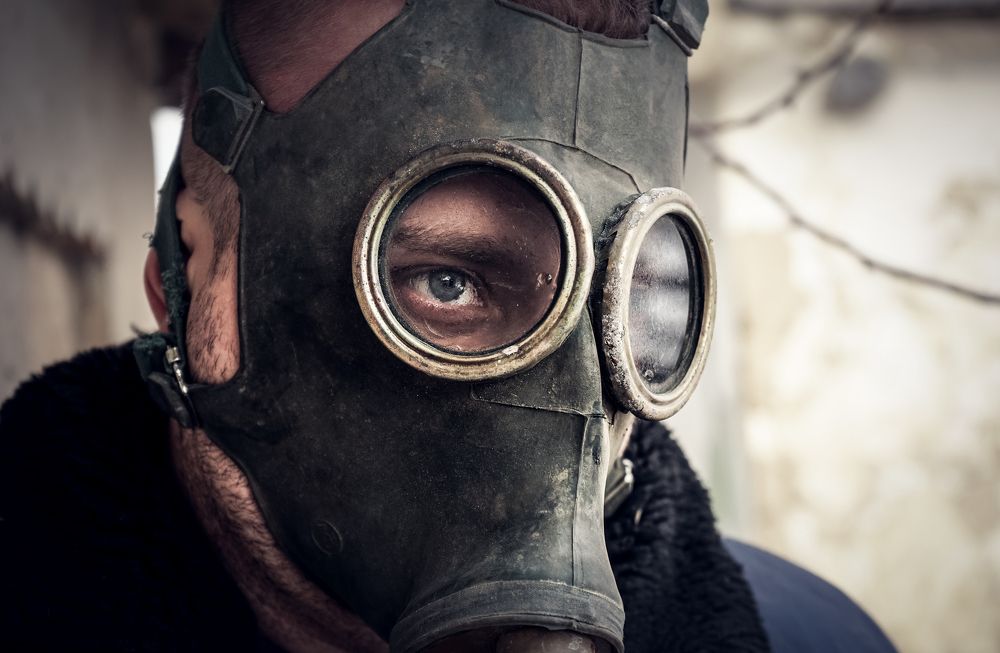 Man in anti-gas mask