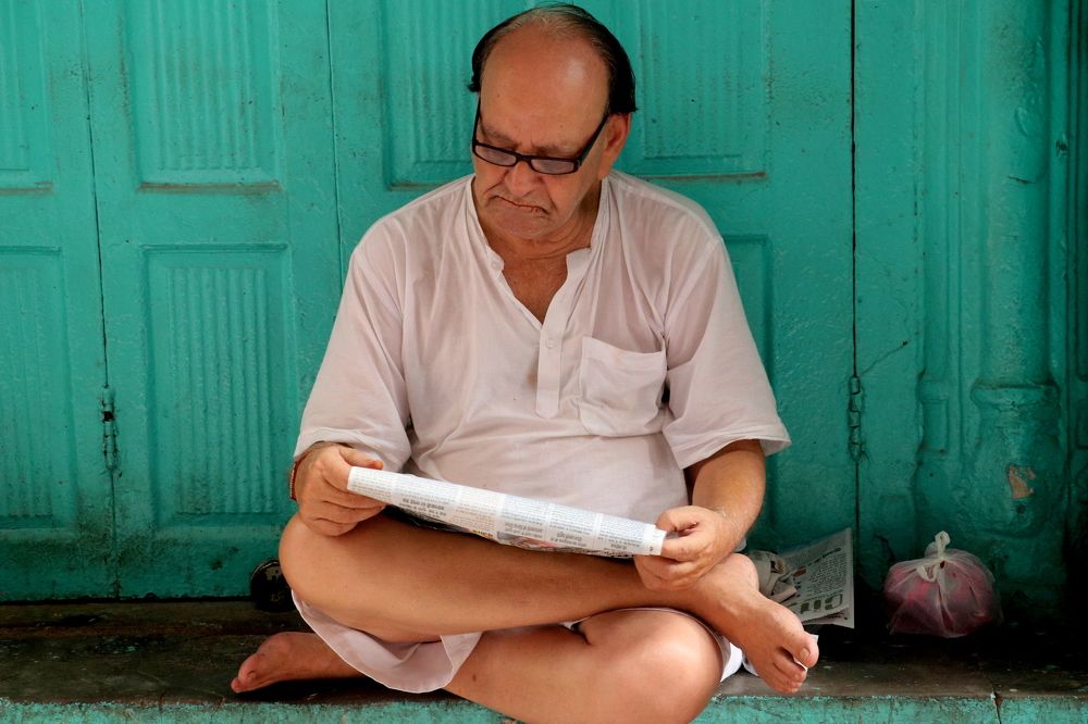 man with a newspaper