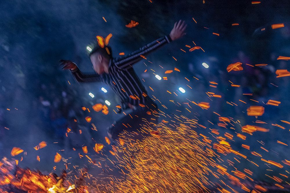 Jump barefoot on fire