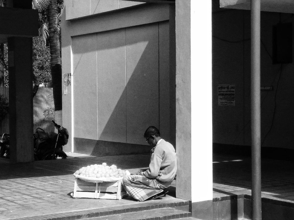 A sad orange seller.