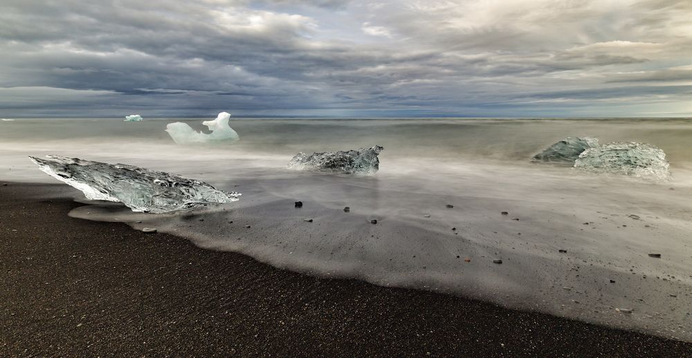Ice on black beach