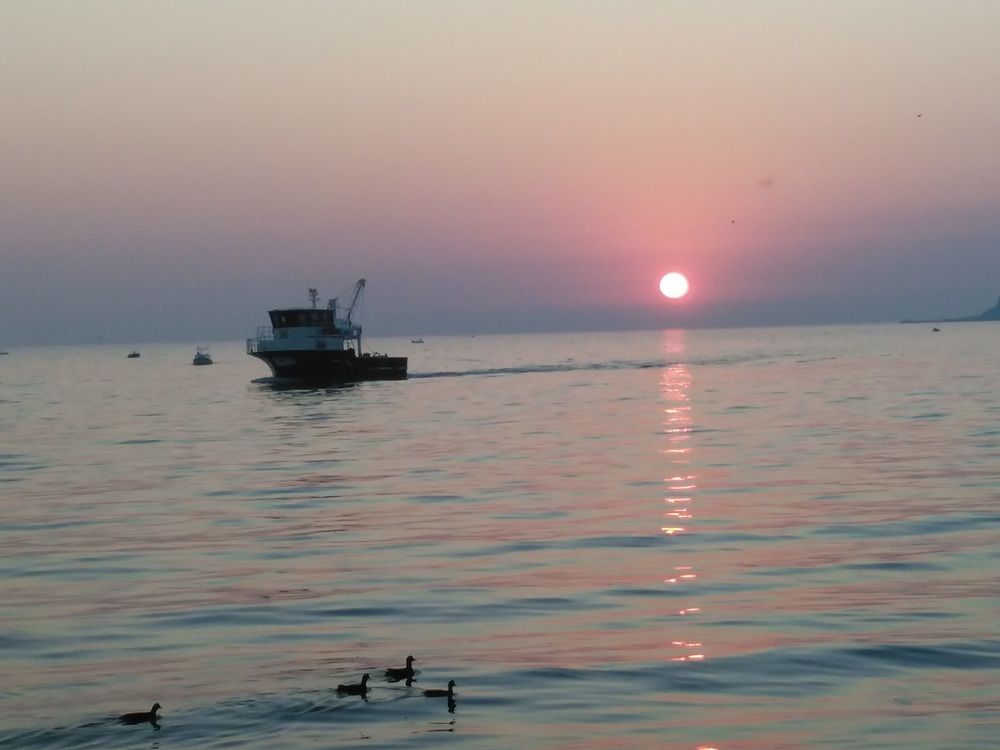 Sunset and the fishing boat