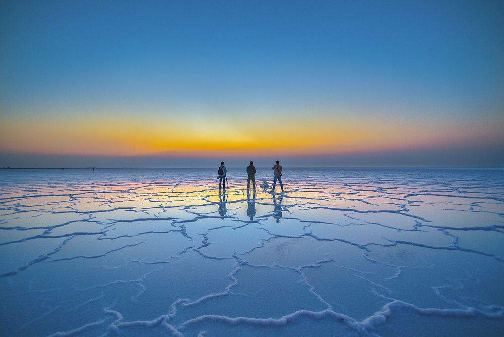 White Runn of Kachchh with three photographer