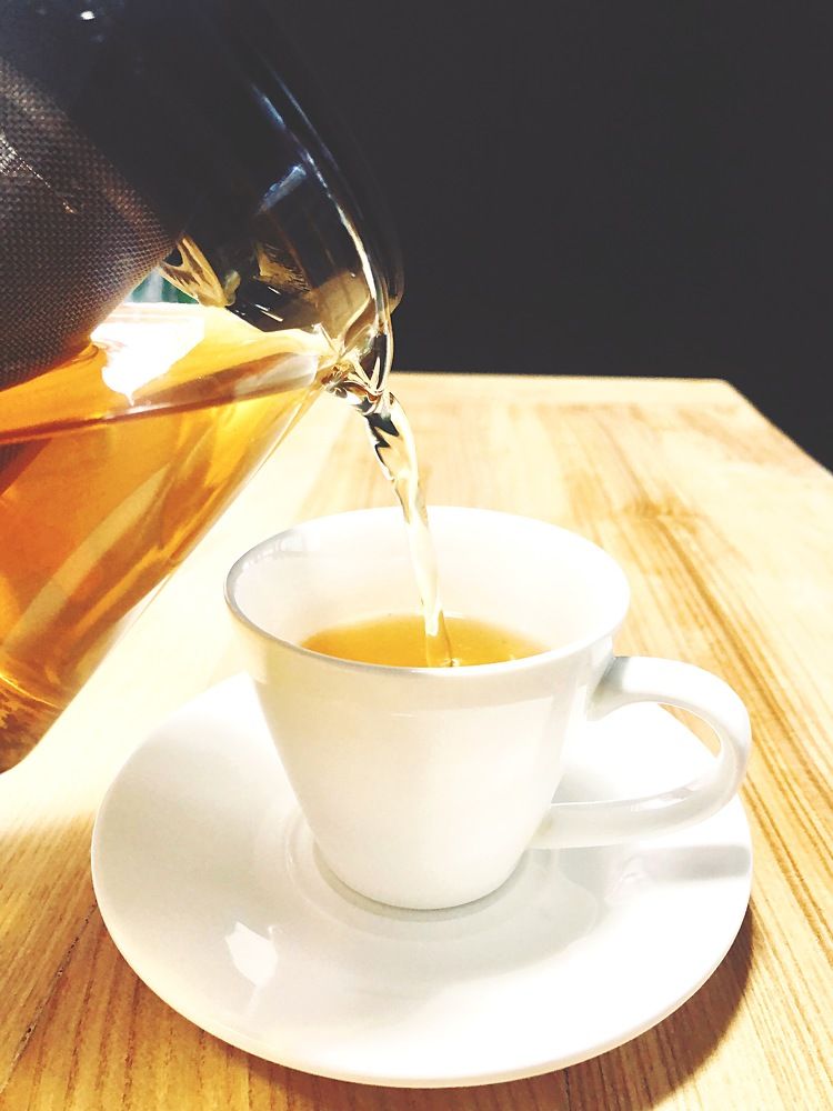 White cup of tea