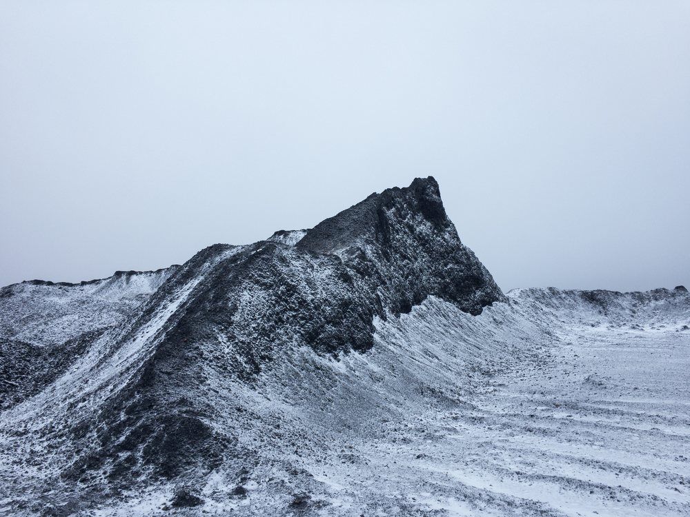 Black rock under the snow