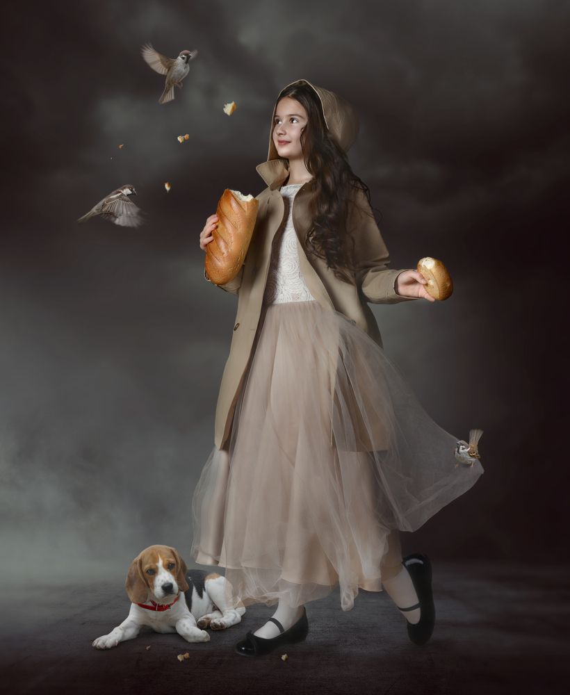 Девочка, кормящая птиц