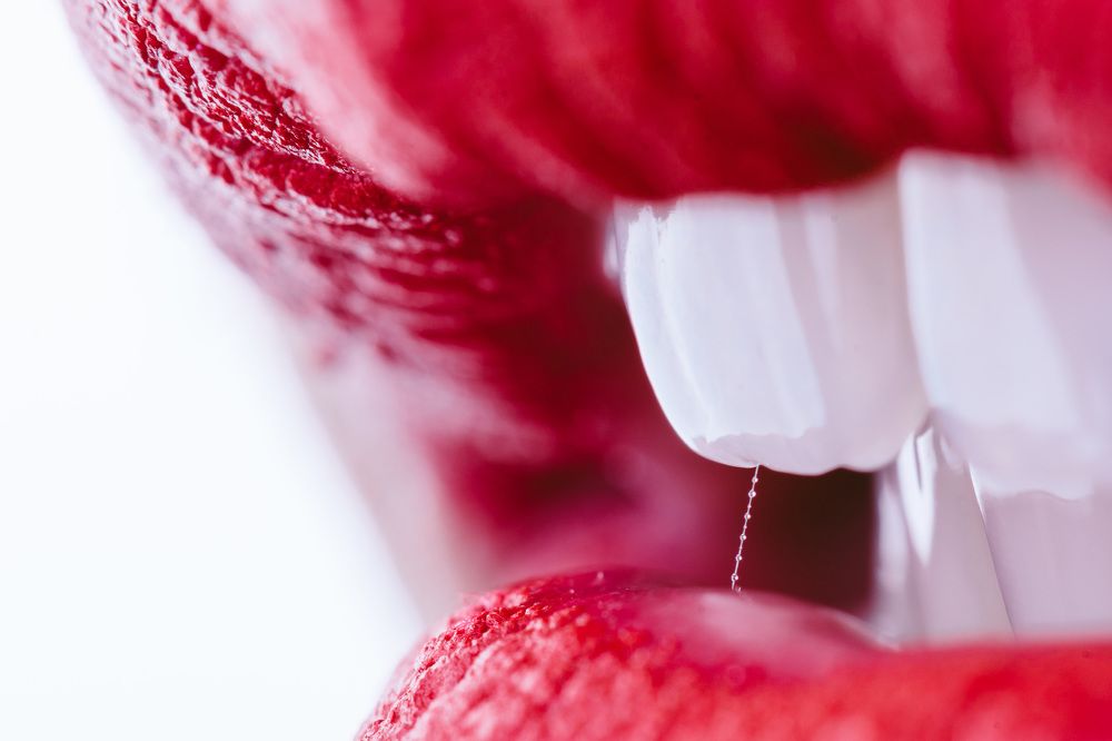 Red lips and white teeth
