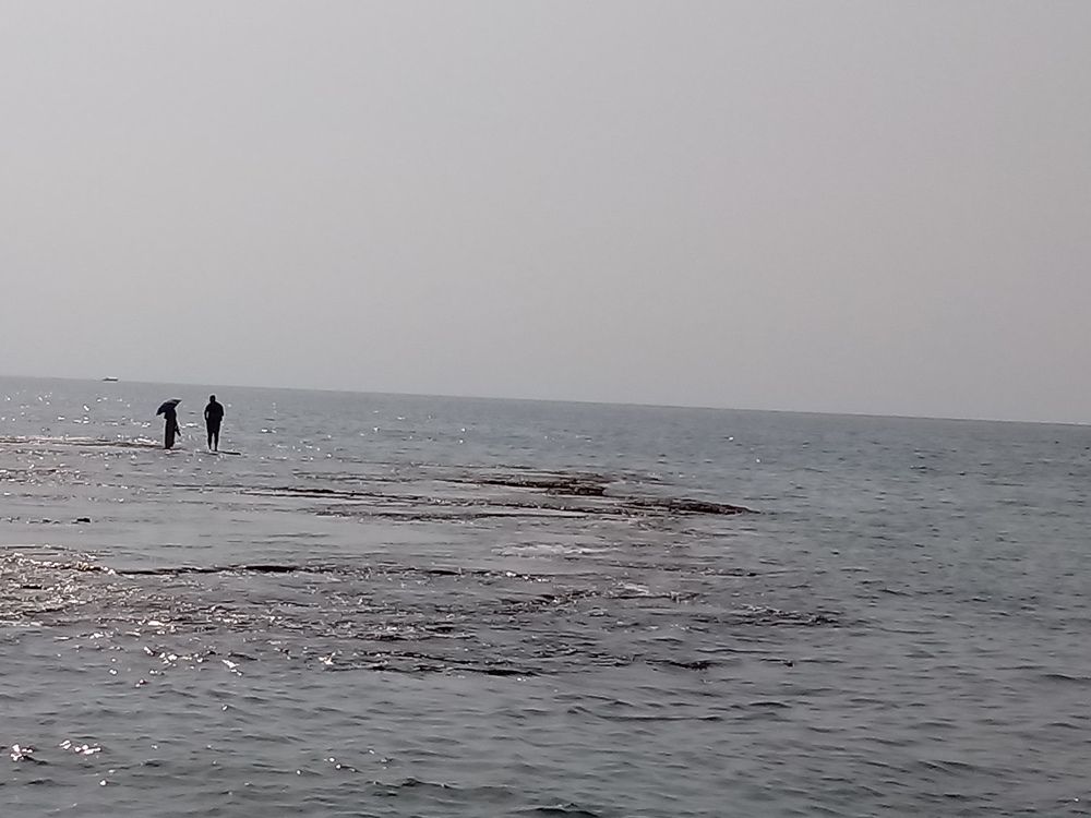 Couple walking on water