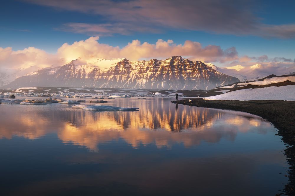 Standing in between mountain and glacier