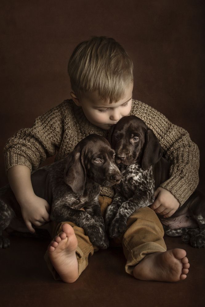 Boy with puppies