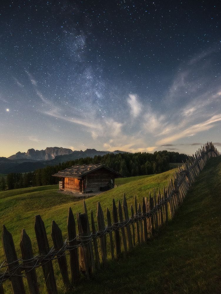 House under starry sky
