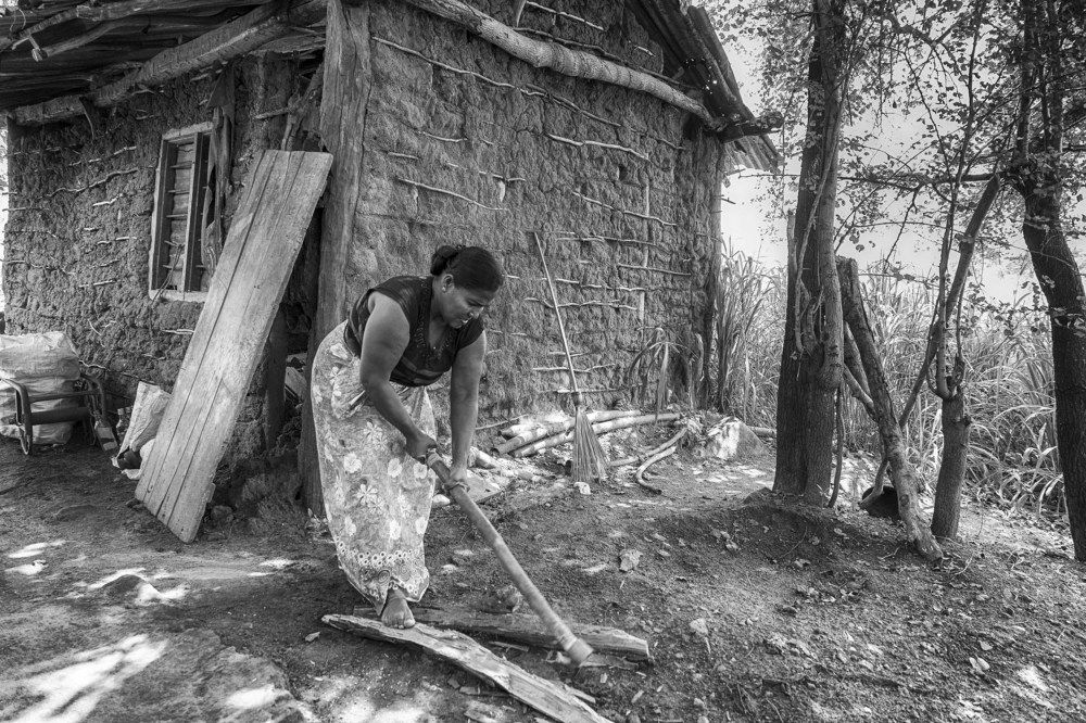 Chopping wood in village
