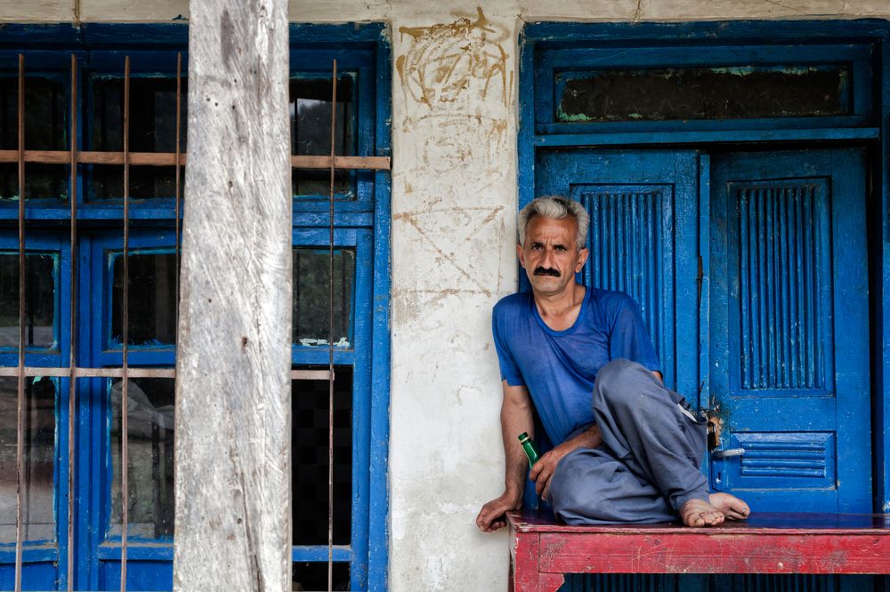 the blue house and its owner