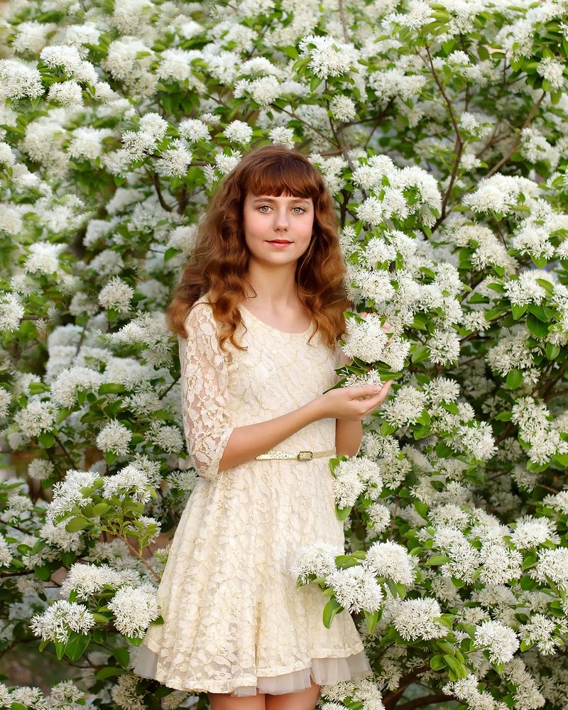 Girl with white flowers.