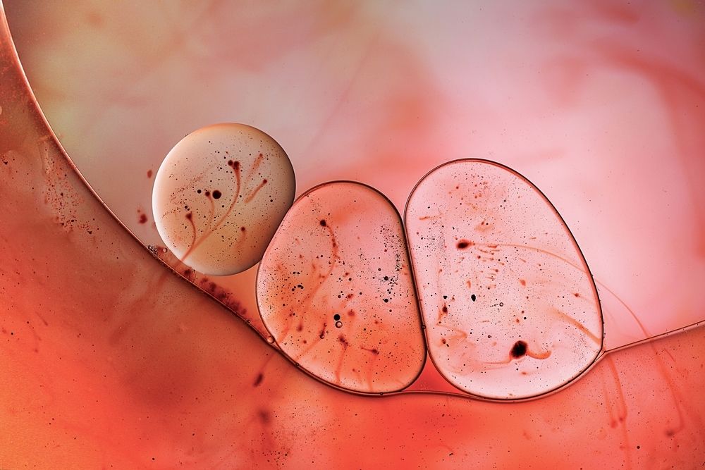 Oil drops on a water surface abstract background