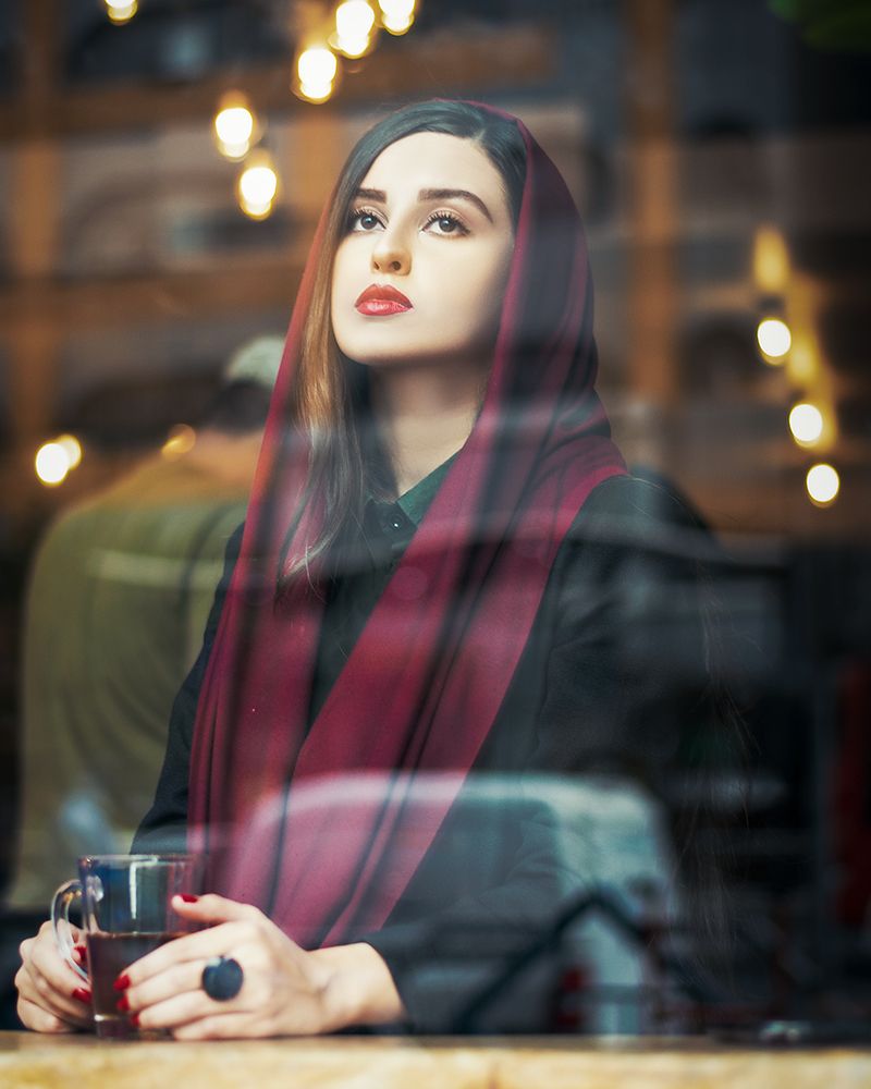 The sad girl in the cafe