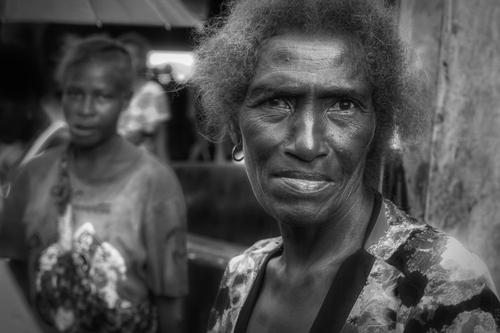 fruit seller at the main market , Honiara , Solomon Islands