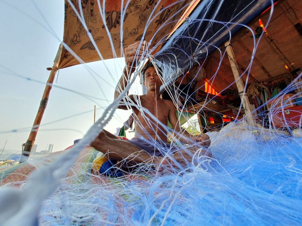 The Man Fixing The Net