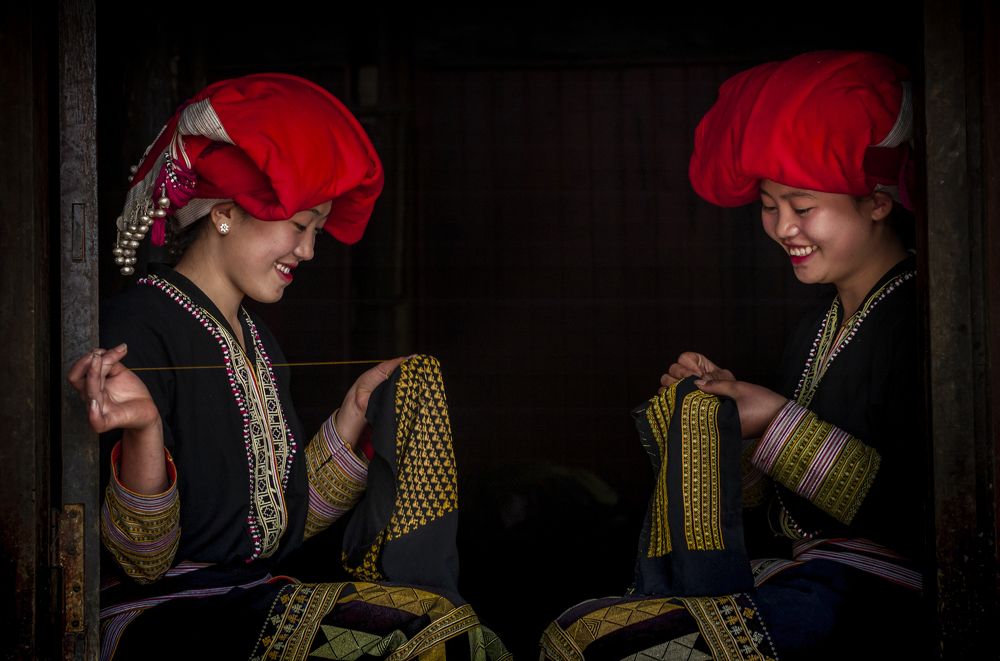 Young woman sewing clothes