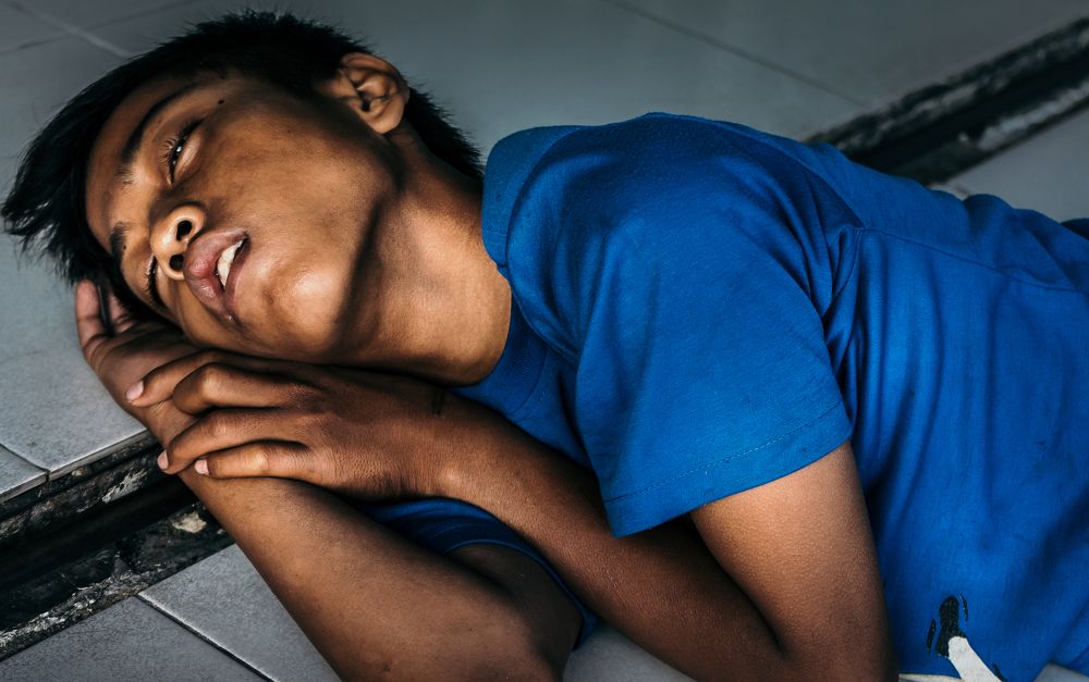 sleep in front of the shopping center