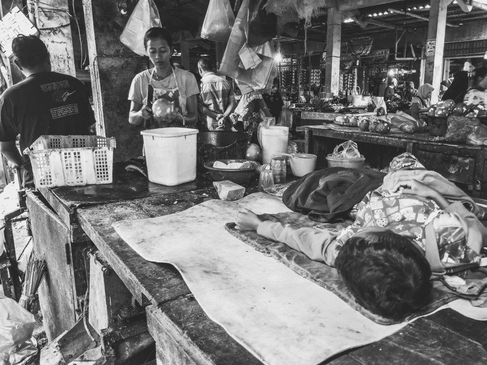 Sleeping Kid In Traditional Market